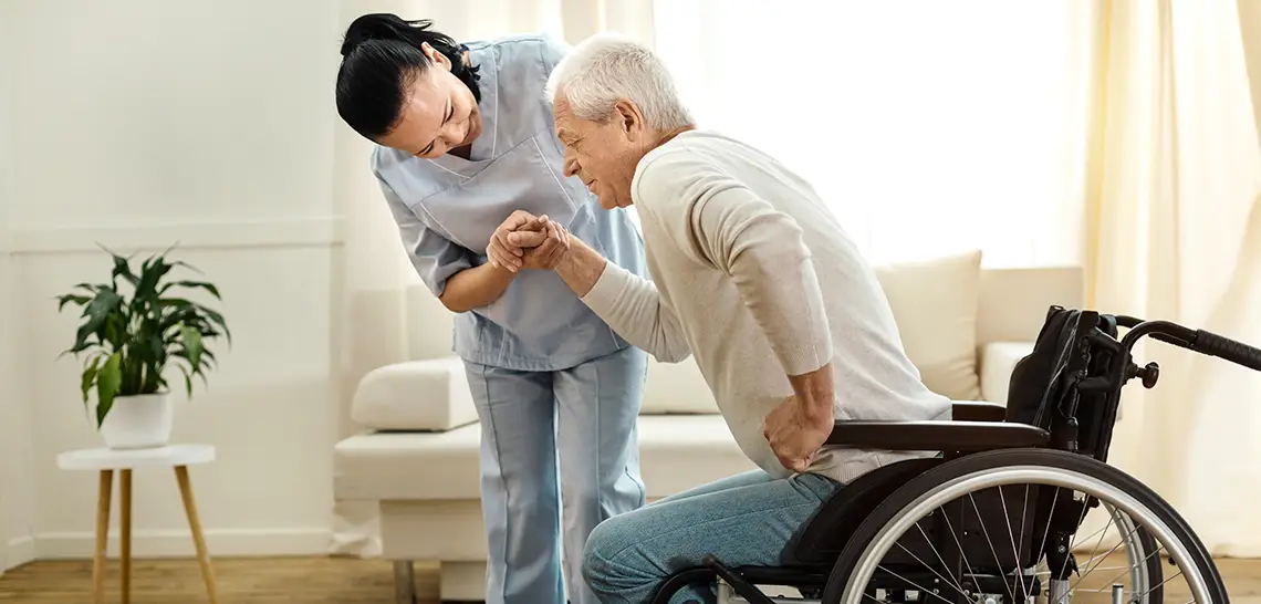 caregiver-with-patient-ts-840774326-1140x546